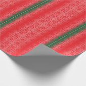 Een felrode appel zit op een effen wit oppervlak. cadeaupapier (Hoek)