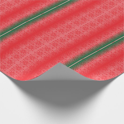 Een felrode appel zit op een effen wit oppervlak. cadeaupapier (Hoek)