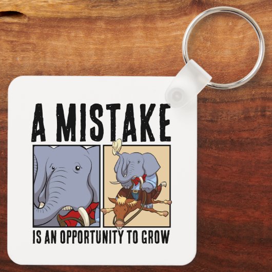Een fout is een kans om olifant te kweken sleutelhanger (Achterkant)