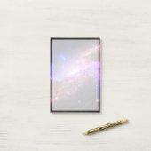 Een galactisch licht Show in spiraalvormige sterre Post-it® Notes (Op bureau)