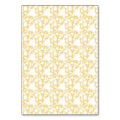 Een geel tapijt met een zich herhalend motief lijk kaart (Achterkant)