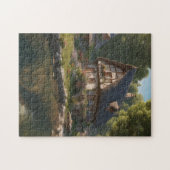 Een geheim dorp: huis bij de magische vijverpuzzel legpuzzel (Horizontaal)
