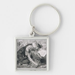 Een geleerd Man geabsorbeerd in de Koran Sleutelhanger