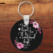 Een gelukkig hart heeft een continu feest sleutelhanger (Voorkant)