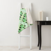 Een geruite en bloemige deken (In situ)