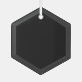 Een gestructureerde zwarte achtergrond vult de afb glas ornament (Voorkant)