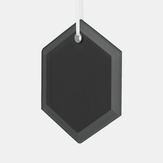 Een gestructureerde zwarte achtergrond vult de afb glas ornament (Voorkant links)