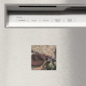 Een geweer, een militaire afdekking en een kantine magneet (Insitu (Vaatwasser))