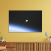 Een gigantische maan zichtbaar boven de atmosfeer  canvas afdruk (Insitu (Woonkamer))