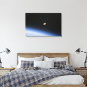 Een gigantische maan zichtbaar boven de atmosfeer  canvas afdruk (Insitu (Slaapkamer))