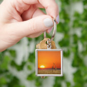 Een giraffe stel loopt de zonsondergang tegemoet, sleutelhanger (Hand)