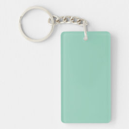Een gladde, effen lichtgroene achtergrond sleutelhanger
