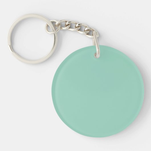 Een gladde, effen lichtgroene achtergrond sleutelhanger (Voorkant)