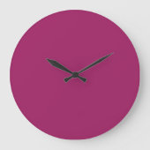 Een gladde paarse achtergrond met een scherp wit b grote klok (Voorkant)