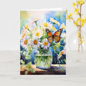 Een glazen vaas van madeliefjes en een monarchvlin kaart (Gele Bloem)