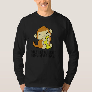Een glimlach als een aap met een nieuwe banaan t-shirt