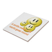 Een glimlach maakt de wereld rond tegeltje (Zijkant)