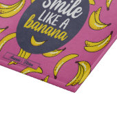 Een grappige glimlach als een bananenretro-fruitpa snijplank (Hoek)