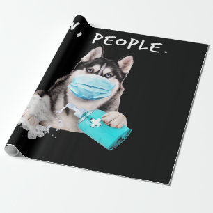 Een grappige husky hond met een cadeau voor een ge cadeaupapier