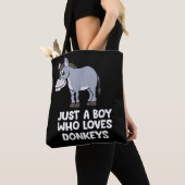 Een grappige jongen die van ezels houdt tote bag (Dichtbij)