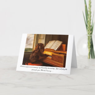 Een grappige verjaardagskaart met hond en piano kaart