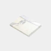 Een grenspoelhond die op de strand loopt post-it® notes (Schuin)