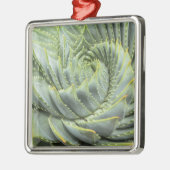 Een groen en wit succes metalen ornament (Links)