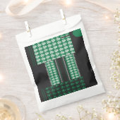 Een groen en zwart patroon met een boom in het mid bedankzakje (Geknipt)