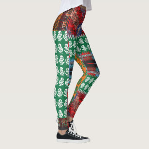 Een groen en zwart patroon met een boom in het mid leggings