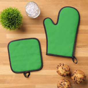 Een groen scherm met een witte achtergrond ovenwant & pannenlap set