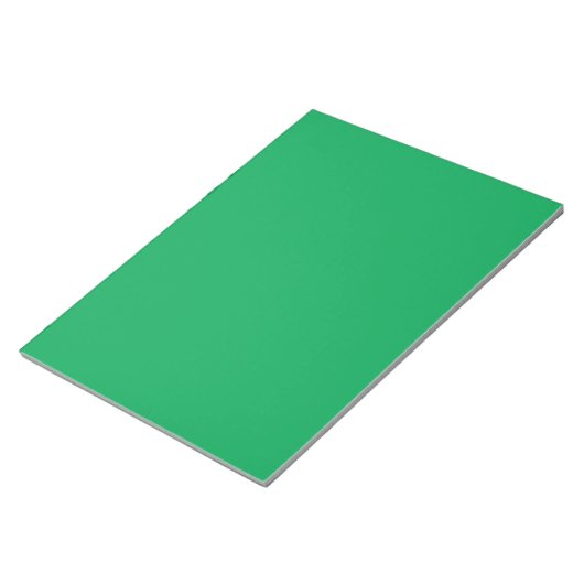 een groene achtergrond en witte rand notitieblok (Schuin)