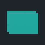 Een groene achtergrond met een save the date<br><div class="desc">Het ontwerp is een helderblauw vierkant met een uniforme kleur en een gladde textuur. Het valt op tegen de achtergrond met een opvallend visueel contrast.</div>