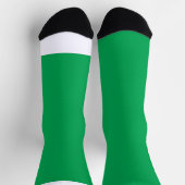 Een groene achtergrond met een sokken (Top)