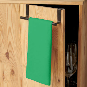 Een groene achtergrond met een theedoek