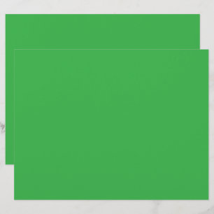 Een groene achtergrond met een witte rand briefhoofd