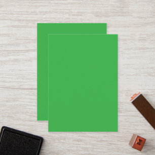Een groene achtergrond met een witte rand klantenkaartje