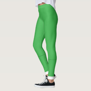 Een groene achtergrond met een witte rand leggings