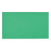 Een groene achtergrond met een witte rand naambadge (Voorkant)