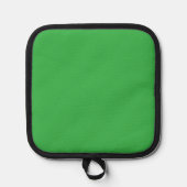 Een groene achtergrond met een witte rand pannenlap (Voorkant)