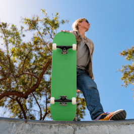 Een groene achtergrond met een witte rand persoonlijk skateboard