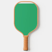 Een groene achtergrond met een witte rand pickleball paddle (Achterkant)