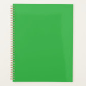 Een groene achtergrond met een witte rand planner (Voorkant)