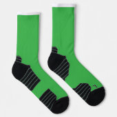 Een groene achtergrond met een witte rand sokken (Rechts)