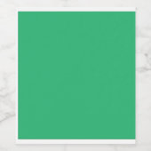 Een groene achtergrond met een witte rand wijn etiket (Enkel label)