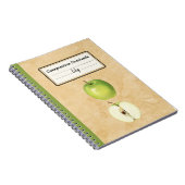 Een groene appel en een half gepersonaliseerde com notitieboek (Rechterzijde)