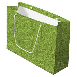 Een groene boodschappentas met een witte handgreep groot cadeauzakje