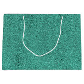Een groene cadeautas met een witte handgreep (Voorkant)