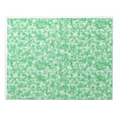 Een groene en witte achtergrond met kleine witte s notitieblok (Voorkant)