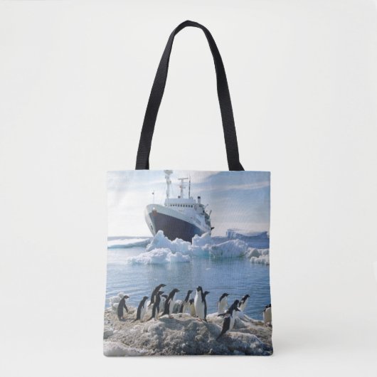 Een groep pinguïns die op een valkuil staan tote bag (Voorkant)