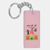 Een gruwelijk tafereel van groene handen die uit d sleutelhanger (Voorkant Links)